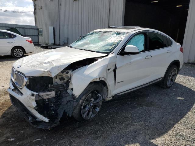 BMW X4 XDRIVE2 2015 with VIN 5UXXW3C57F0M86545 - Photo from auction