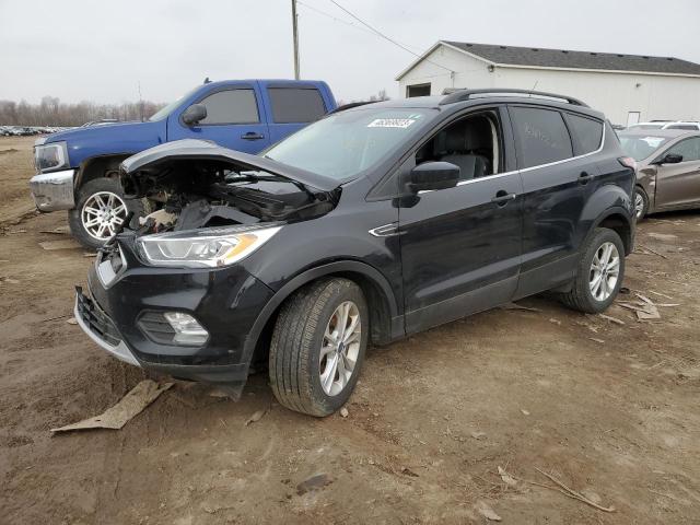 FORD ESCAPE SE 2017 with VIN 1FMCU9GD6HUE75487 - Photo from auction