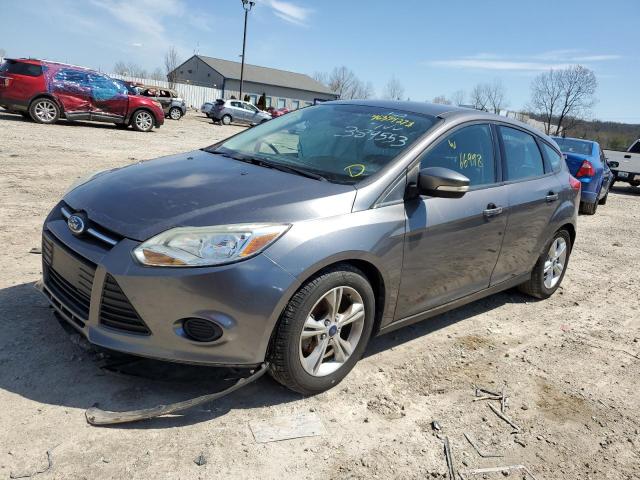 FORD FOCUS SE 2014 with VIN 1FADP3K29EL389553 - Photo from auction