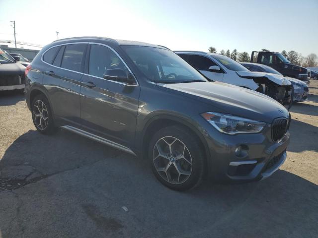 Photo 4 from auction – 2017 BMW X1 XDRIVE2 with VIN WBXHT3C38H5F77865