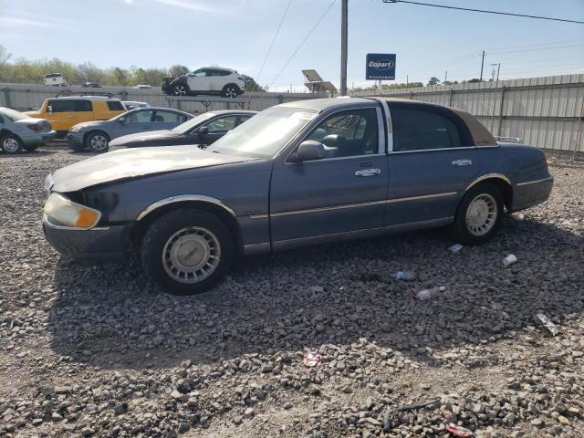 LINCOLN TOWN CAR E 1999 with VIN 1LNHM81W4XY660963 - Photo from auction