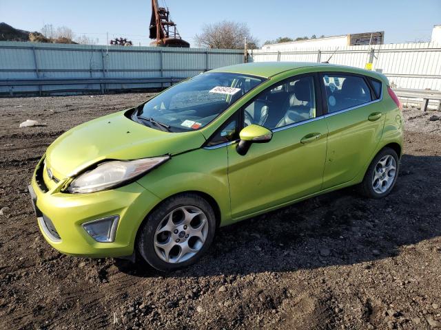 FORD FIESTA SES 2011 with VIN 3FADP4FJ2BM165915 - Photo from auction