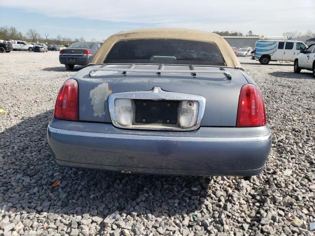Photo 6 from auction – 1999 LINCOLN TOWN CAR E with VIN 1LNHM81W4XY660963