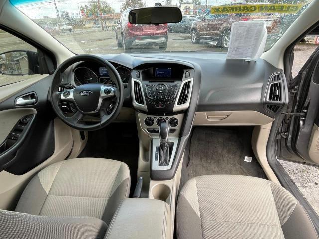 Photo 9 from auction – 2014 FORD FOCUS SE with VIN 1FADP3F25EL272059