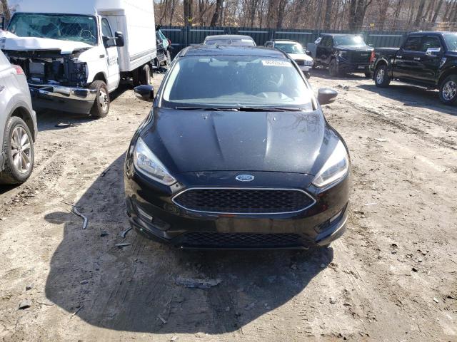 Photo 5 from auction – 2015 FORD FOCUS SE with VIN 1FADP3K2XFL229117