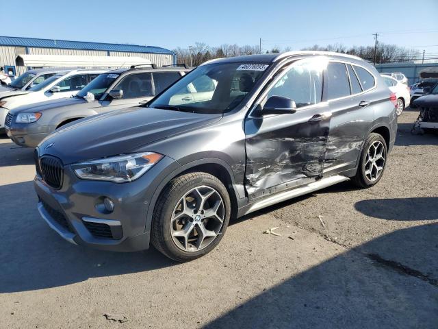 BMW X1 XDRIVE2 2017 with VIN WBXHT3C38H5F77865 - Photo from auction
