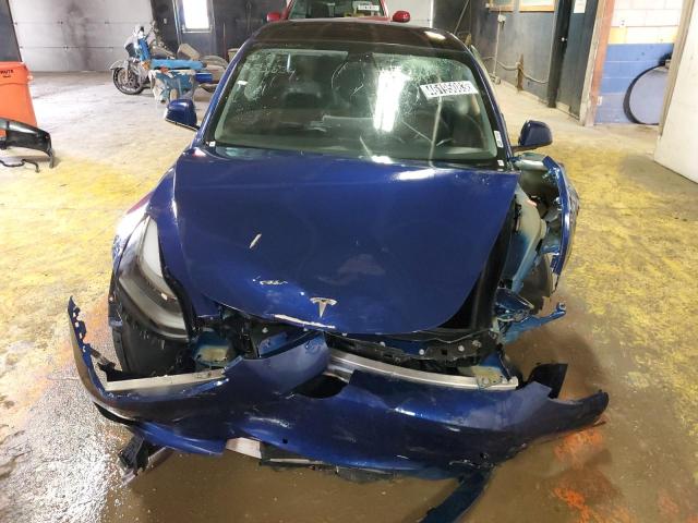 Photo 5 from auction – 2022 TESLA MODEL 3 with VIN 5YJ3E1EB0NF285824