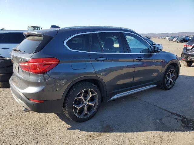 Photo 3 from auction – 2017 BMW X1 XDRIVE2 with VIN WBXHT3C38H5F77865