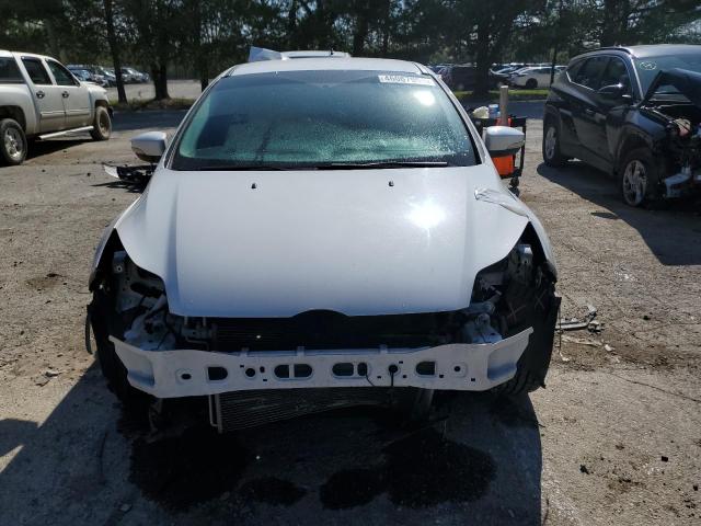Photo 5 from auction – 2014 FORD FOCUS TITA with VIN 1FADP3J22EL204728