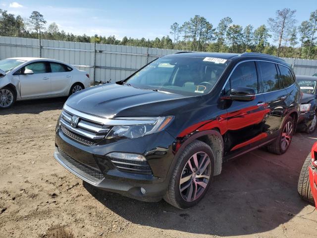 HONDA PILOT ELIT 2017 with VIN 5FNYF6H09HB064561 - Photo from auction