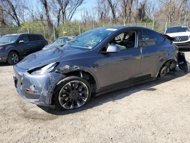 TESLA MODEL Y 2022 with VIN 7SAYGDEE2NF387379 - Photo from auction