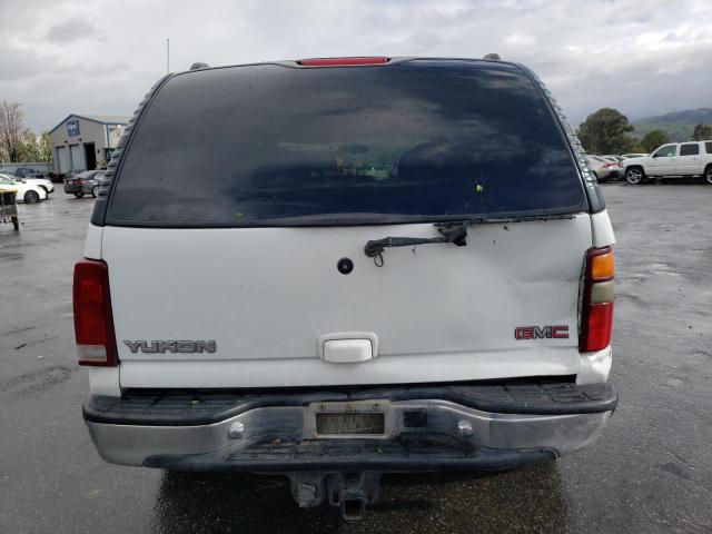 Photo 6 from auction – 2002 GMC YUKON with VIN 1GKEC13V52J292630