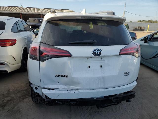 Photo 6 from auction – 2017 TOYOTA RAV4 XLE with VIN JTMRFREV1HD209265