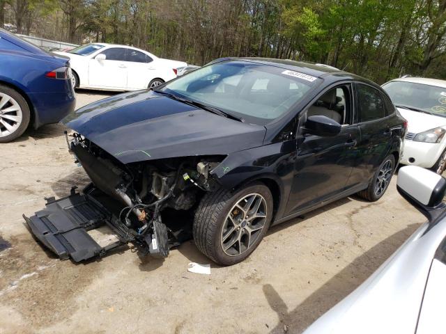 FORD FOCUS SE 2018 with VIN 1FADP3F29JL238166 - Photo from auction