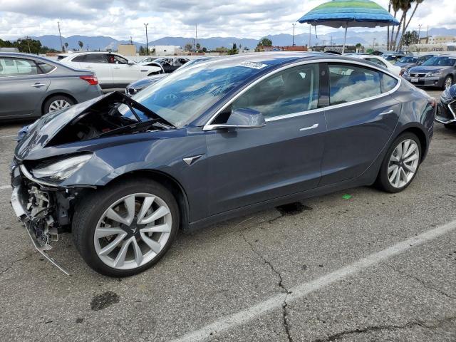 TESLA MODEL 3 2018 with VIN 5YJ3E1EA7JF035644 - Photo from auction