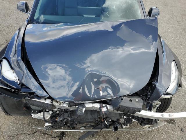 Photo 11 from auction – 2018 TESLA MODEL 3 with VIN 5YJ3E1EA7JF035644