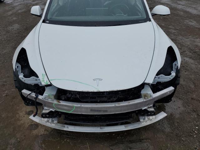 Photo 11 from auction – 2022 TESLA MODEL 3 with VIN 5YJ3E1EB0NF190339