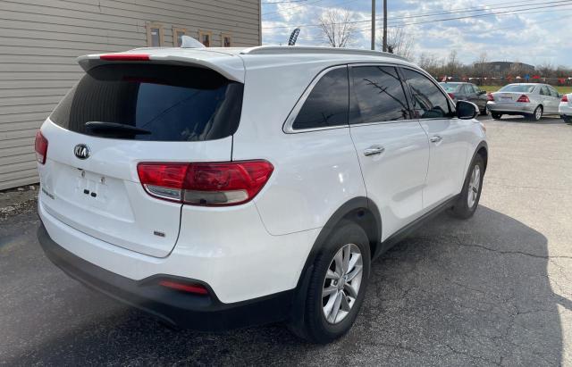 Photo 4 from auction – 2018 KIA SORENTO LX with VIN 5XYPG4A34JG357557