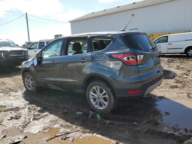 Photo 2 from auction – 2017 FORD ESCAPE SE with VIN 1FMCU9GD1HUC08063