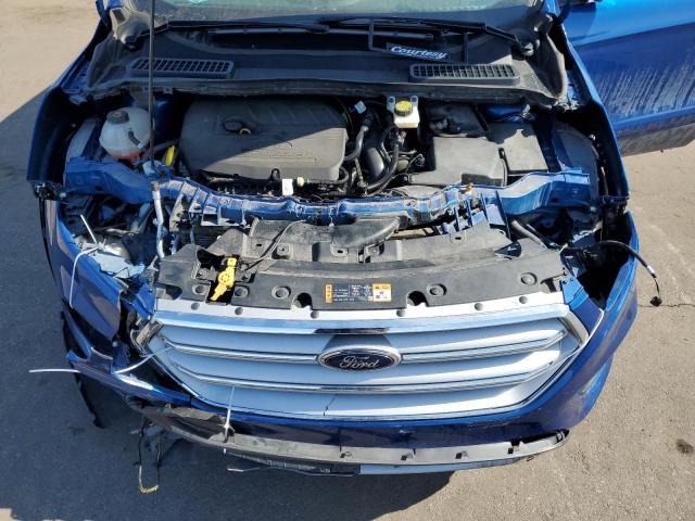 Photo 12 from auction – 2018 FORD ESCAPE SE with VIN 1FMCU9GD9JUC02856