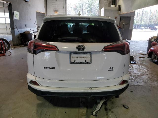 Photo 6 from auction – 2018 TOYOTA RAV4 LE with VIN JTMBFREV7JJ194585