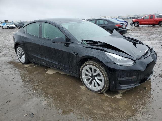 Photo 4 from auction – 2022 TESLA MODEL 3 with VIN 5YJ3E1EBXNF191028