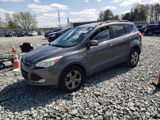 FORD ESCAPE SE 2014 with VIN 1FMCU0GX4EUA74490 - Photo from auction
