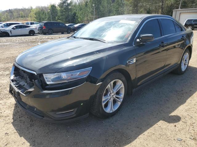 FORD TAURUS SEL 2014 with VIN 1FAHP2H81EG143936 - Photo from auction