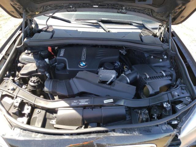 Photo 11 from auction – 2014 BMW X1 XDRIVE2 with VIN WBAVL1C54EVY19093