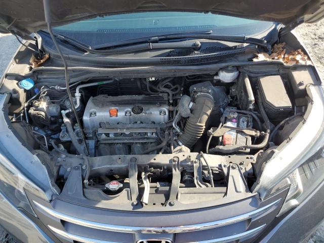 Photo 12 from auction – 2014 HONDA CR-V LX with VIN 3CZRM3H37EG711669