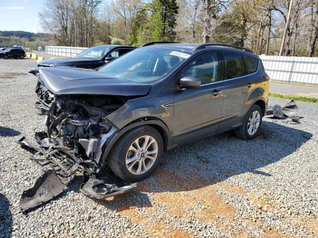 FORD ESCAPE SE 2018 with VIN 1FMCU0GD1JUC32137 - Photo from auction