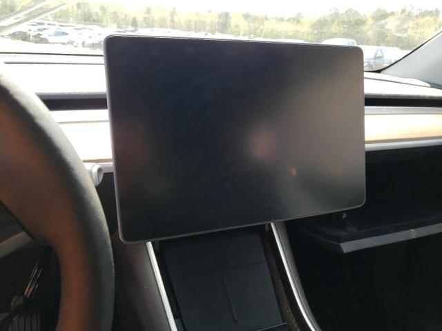 Photo 9 from auction – 2021 TESLA MODEL Y with VIN 5YJYGDEE6MF104042
