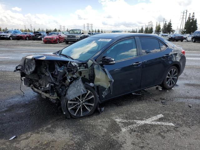 TOYOTA COROLLA L 2018 with VIN 5YFBURHE6JP799212 - Photo from auction