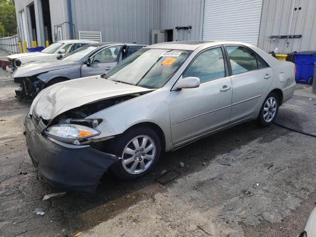 TOYOTA CAMRY LE 2003 with VIN JTDBF30K730142876 - Photo from auction