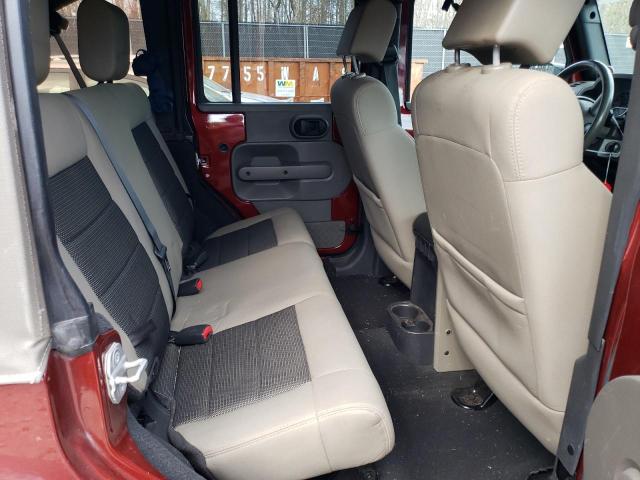 Photo 11 from auction – 2010 JEEP WRANGLER U with VIN 1J4BA5H11AL127186
