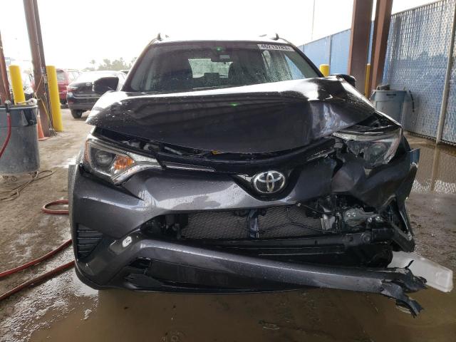 Photo 5 from auction – 2017 TOYOTA RAV4 LE with VIN JTMZFREV7HJ110922