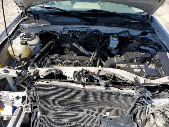 Photo 11 from auction – 2009 MERCURY MARINER PR with VIN 4M2CU87739KJ13259