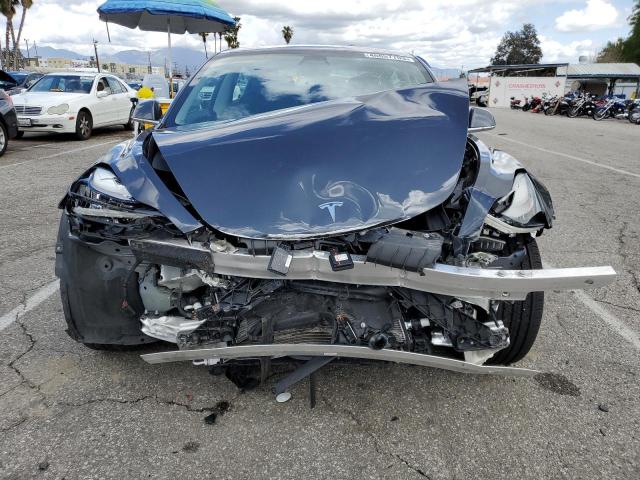 Photo 5 from auction – 2018 TESLA MODEL 3 with VIN 5YJ3E1EA7JF035644