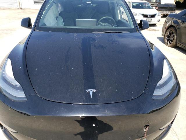 Photo 11 from auction – 2021 TESLA MODEL Y with VIN 5YJYGDEE6MF104042