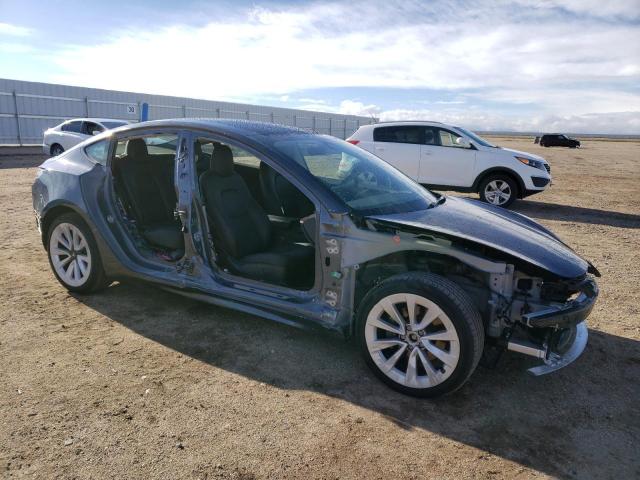 Photo 4 from auction – 2022 TESLA MODEL 3 with VIN 5YJ3E1EB1NF305028