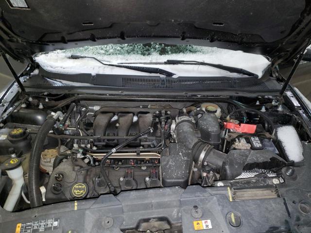 Photo 11 from auction – 2014 FORD TAURUS SEL with VIN 1FAHP2E88EG140147