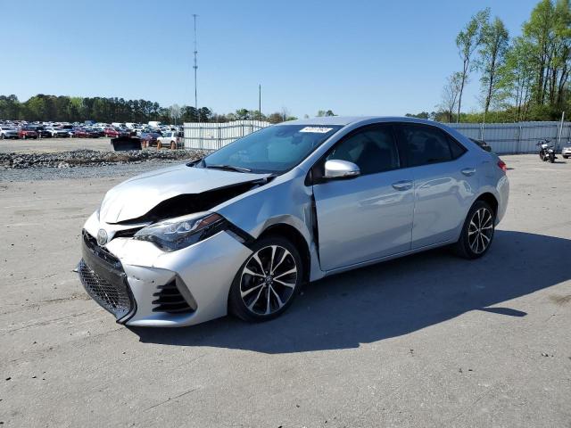 TOYOTA COROLLA L 2017 with VIN 2T1BURHE1HC754804 - Photo from auction