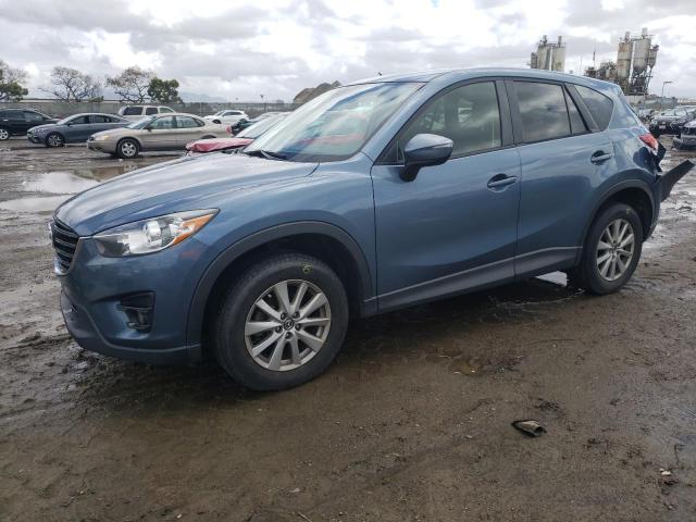 MAZDA CX-5 TOURI 2016 with VIN JM3KE2CY5G0884994 - Photo from auction