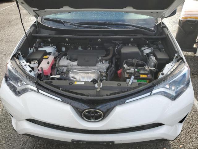 Photo 12 from auction – 2018 TOYOTA RAV4 LE with VIN 2T3ZFREV5JW478135