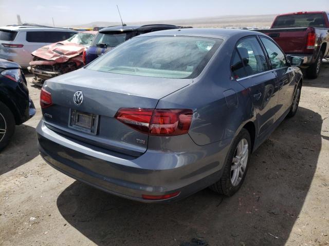 Photo 3 from auction – 2017 VOLKSWAGEN JETTA S with VIN 3VW2B7AJ7HM200771