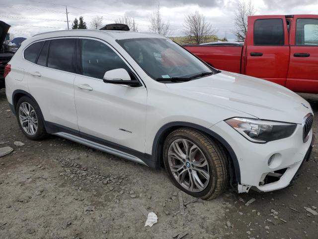 Photo 4 from auction – 2017 BMW X1 XDRIVE2 with VIN WBXHT3C35H5F76043