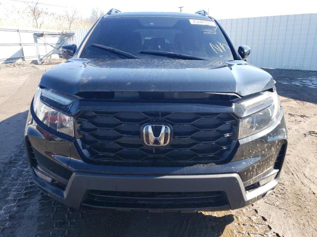 Photo 5 from auction – 2022 HONDA PASSPORT E with VIN 5FNYF8H07NB014779