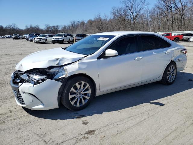TOYOTA CAMRY LE 2017 with VIN 4T1BF1FKXHU356493 - Photo from auction