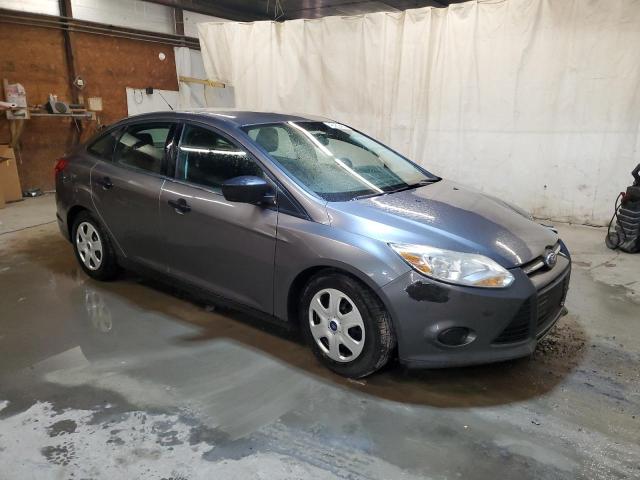 Photo 4 from auction – 2014 FORD FOCUS S with VIN 1FADP3E22EL127658
