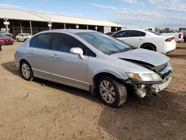 Photo 4 from auction – 2011 HONDA CIVIC LX with VIN 19XFA1F59BE027742